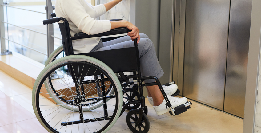 Colorado interior designer consulting with client in a wheelchair for accessible home design