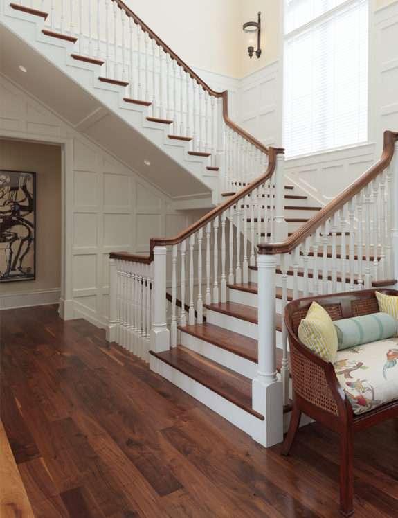 classic railing design with white paneled staircase