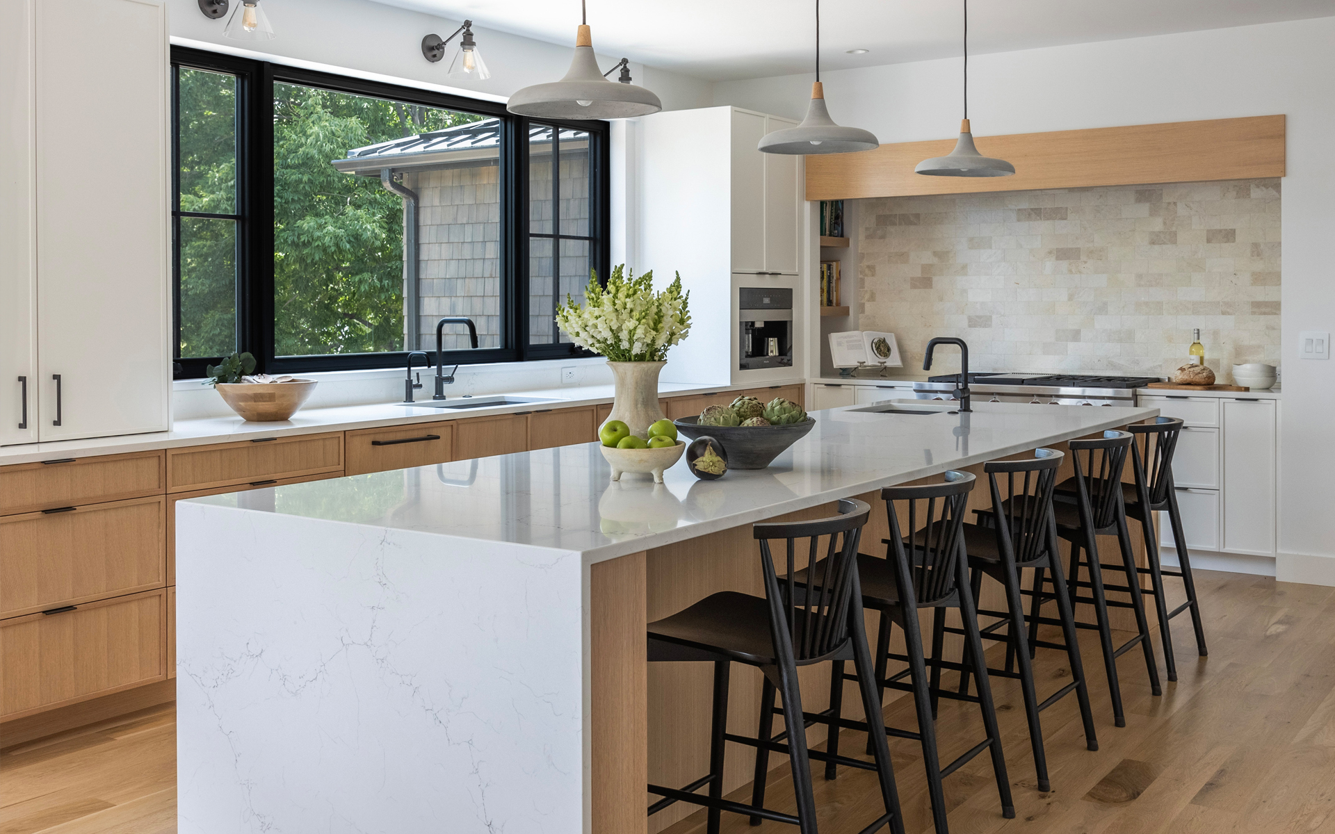 White and black kitchen design with modern interior styling in Boulder Colorado home